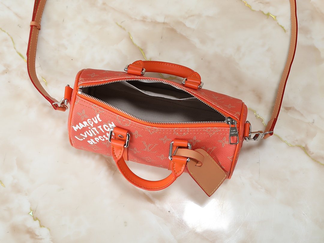Louis Vuitton Keepall Orange Monogram Barrel Bag — front