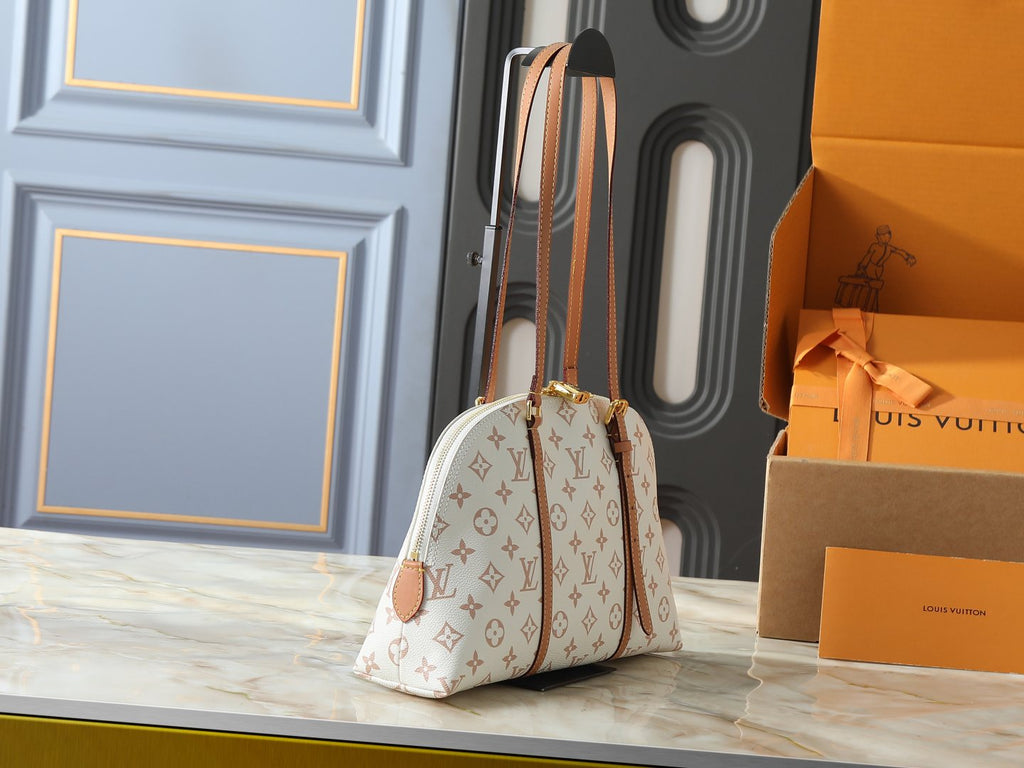 Louis Vuitton Squire Cream Monogram Handbag — side