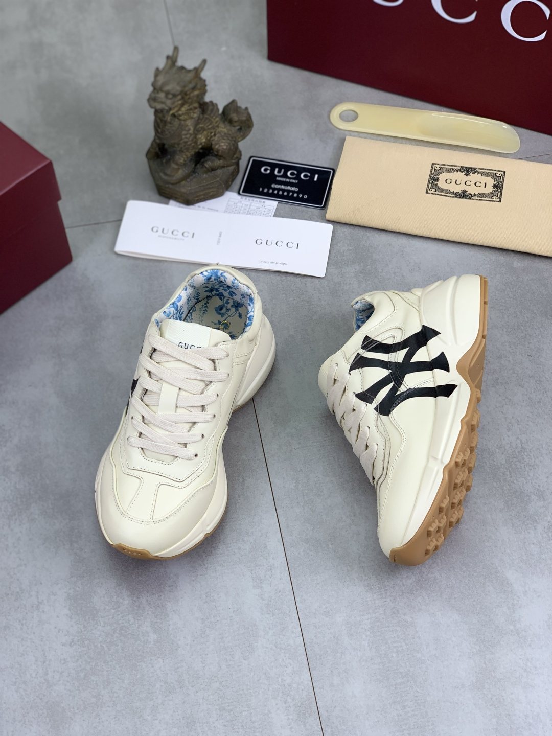 Gucci Cream Chunky Sneakers with Black Accents — front