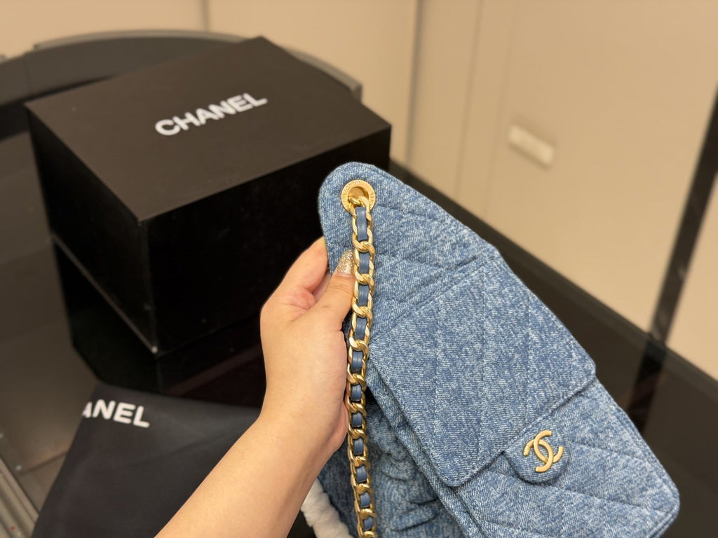 Chanel 25 Blue Quilted Hobo Bag — front