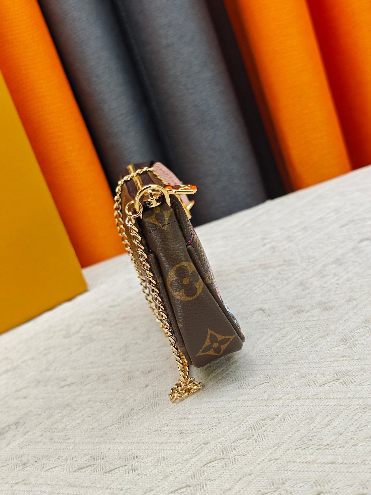 Louis Vuitton Illustrated Monogram Chain Pouch — side