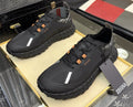 ZEGNA Black Trail Running Shoes with Orange Accents — hero