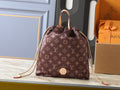 Louis Vuitton Keeper Monogram Drawstring Clutch — hero
