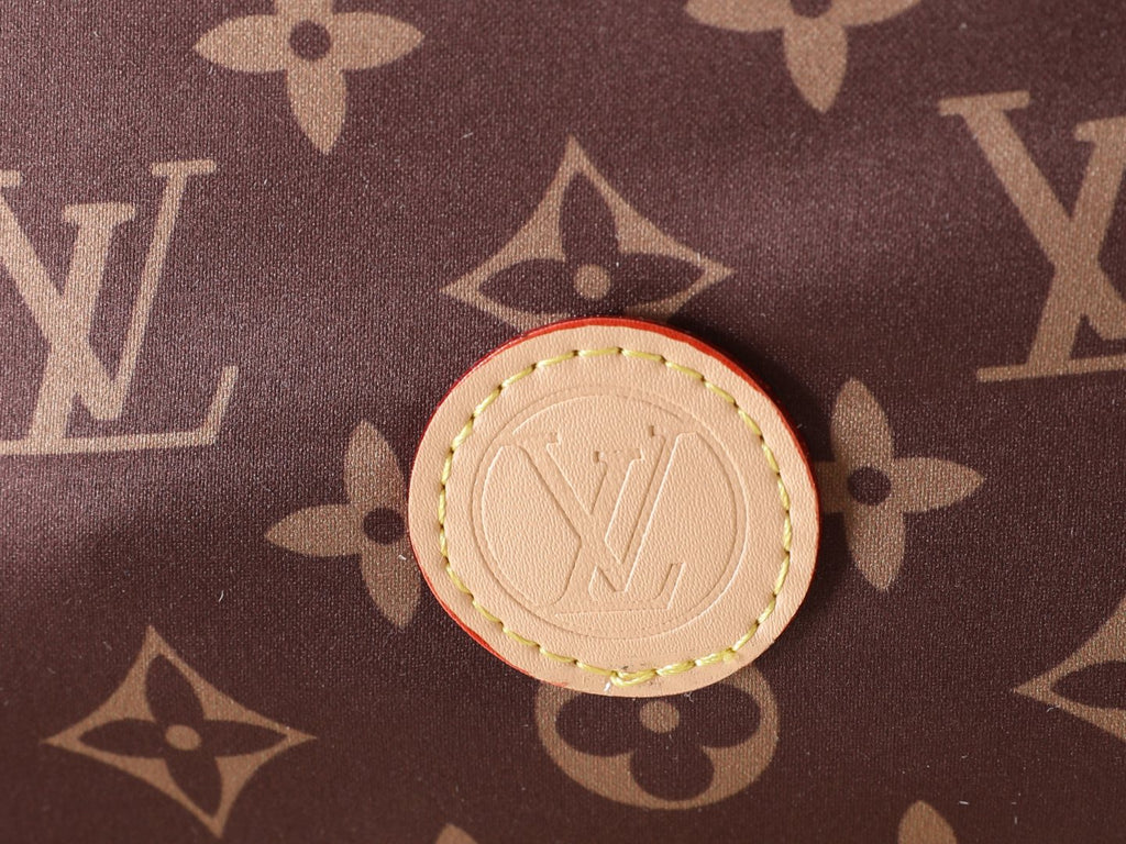 Louis Vuitton Keeper Monogram Drawstring Clutch — detail