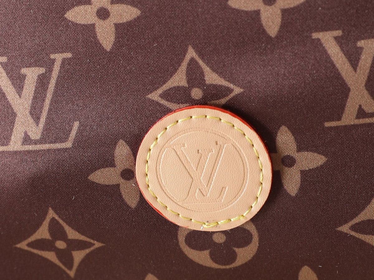 Louis Vuitton Keeper Monogram Drawstring Clutch — detail