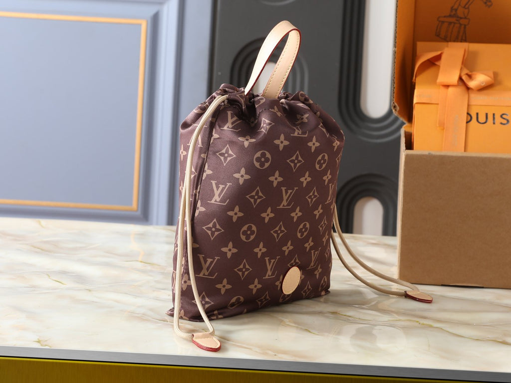 Louis Vuitton Keeper Monogram Drawstring Clutch — side