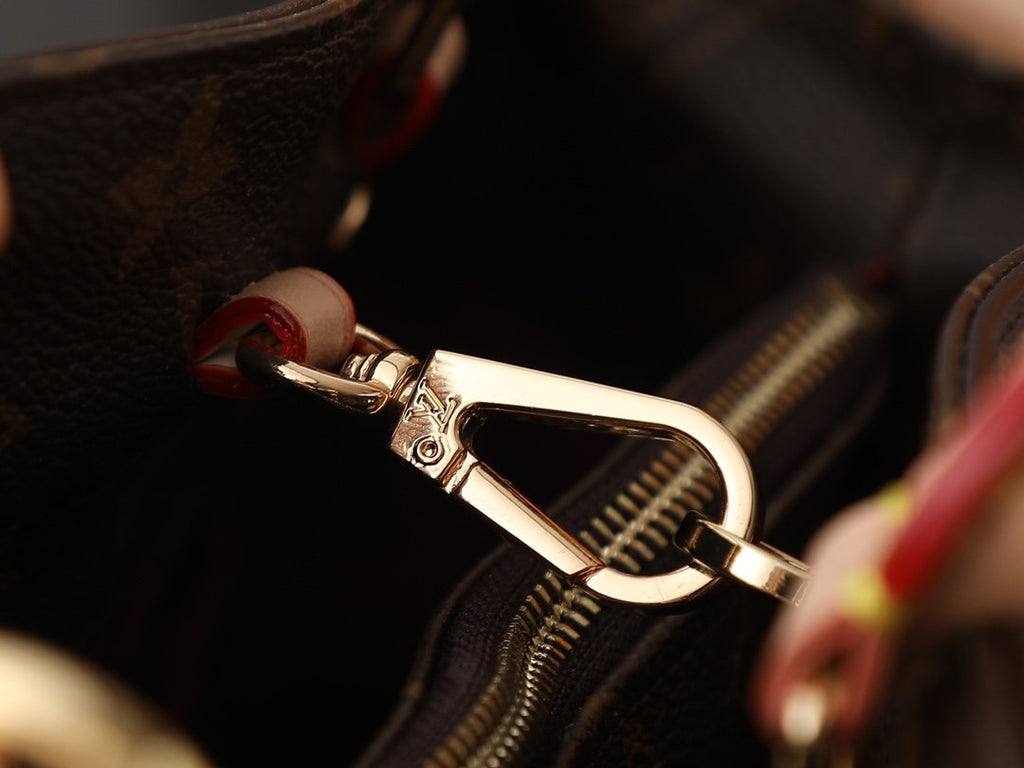 Louis Vuitton Montaigne Monogram Top-Handle Bag — detail