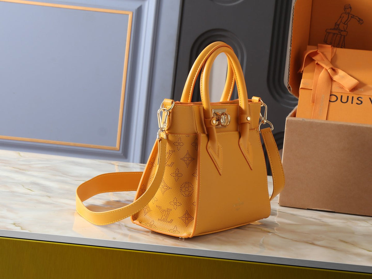 Louis Vuitton On My Side Turn-Lock Tote — side