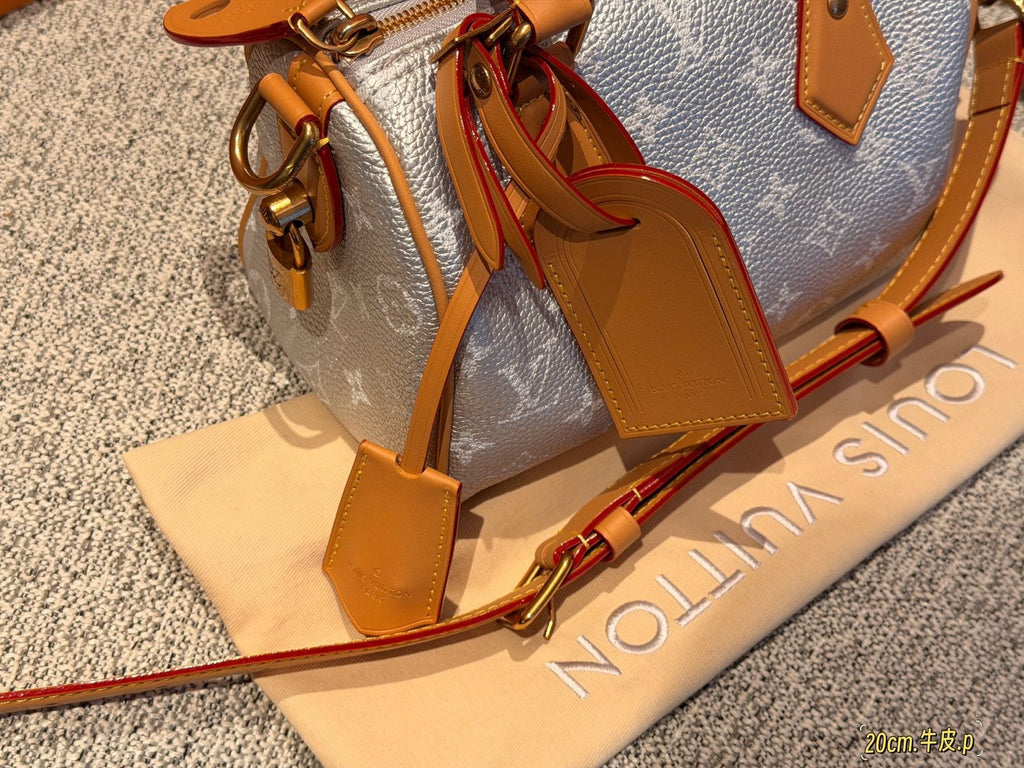 Louis Vuitton Speedy Rolled-Handle Satchel — detail
