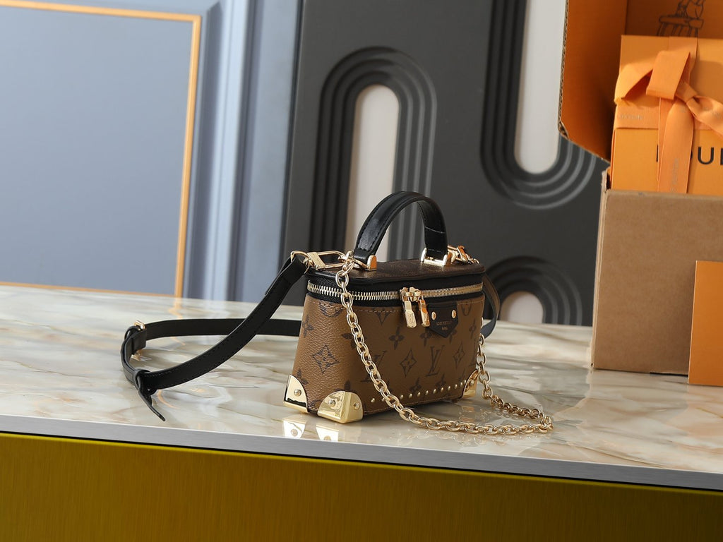 Louis Vuitton Vanity Pouch Monogram Trunk Handbag — side