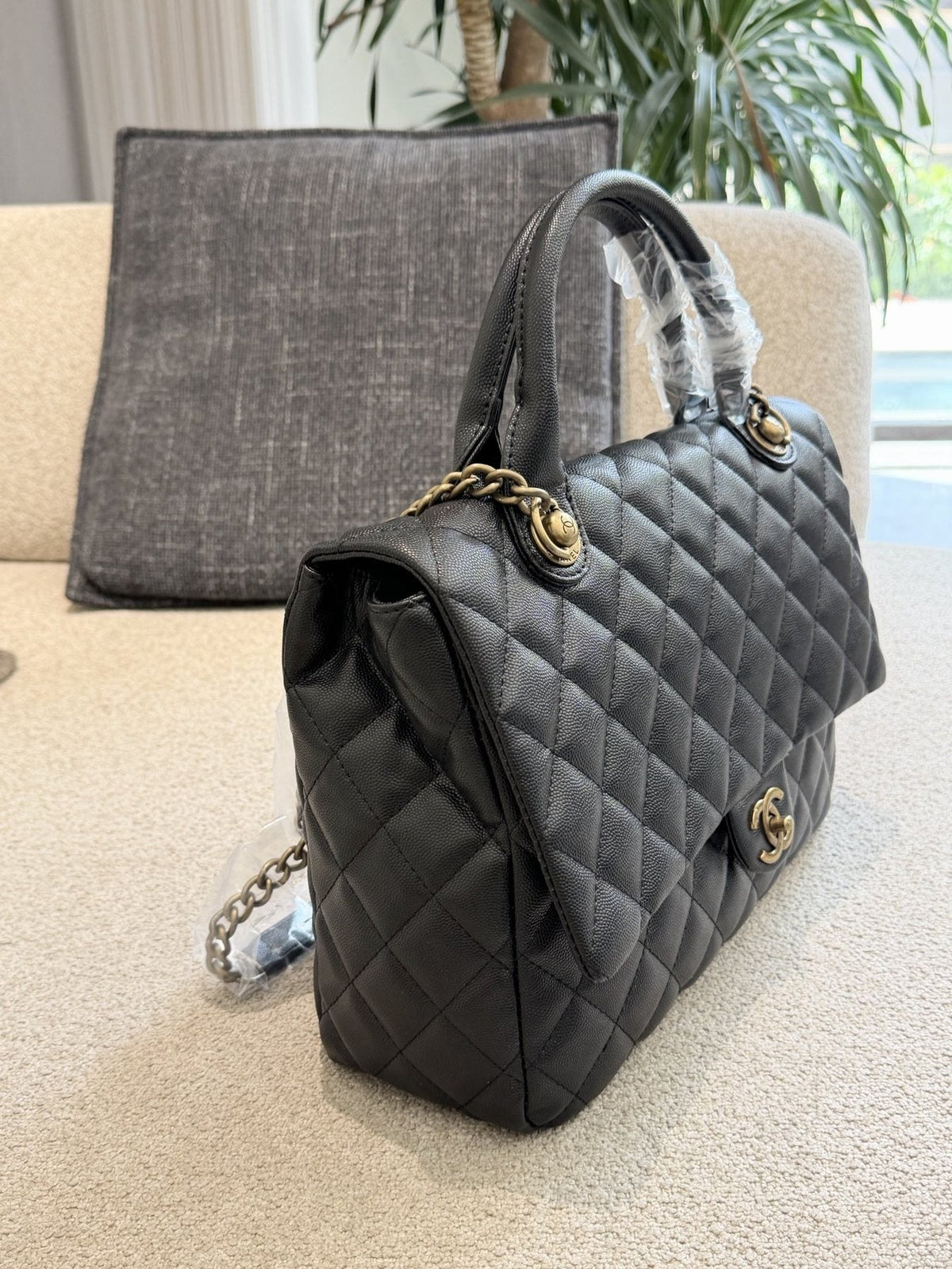 Chanel Diamond-Quilted Top-Handle Flap Bag — side