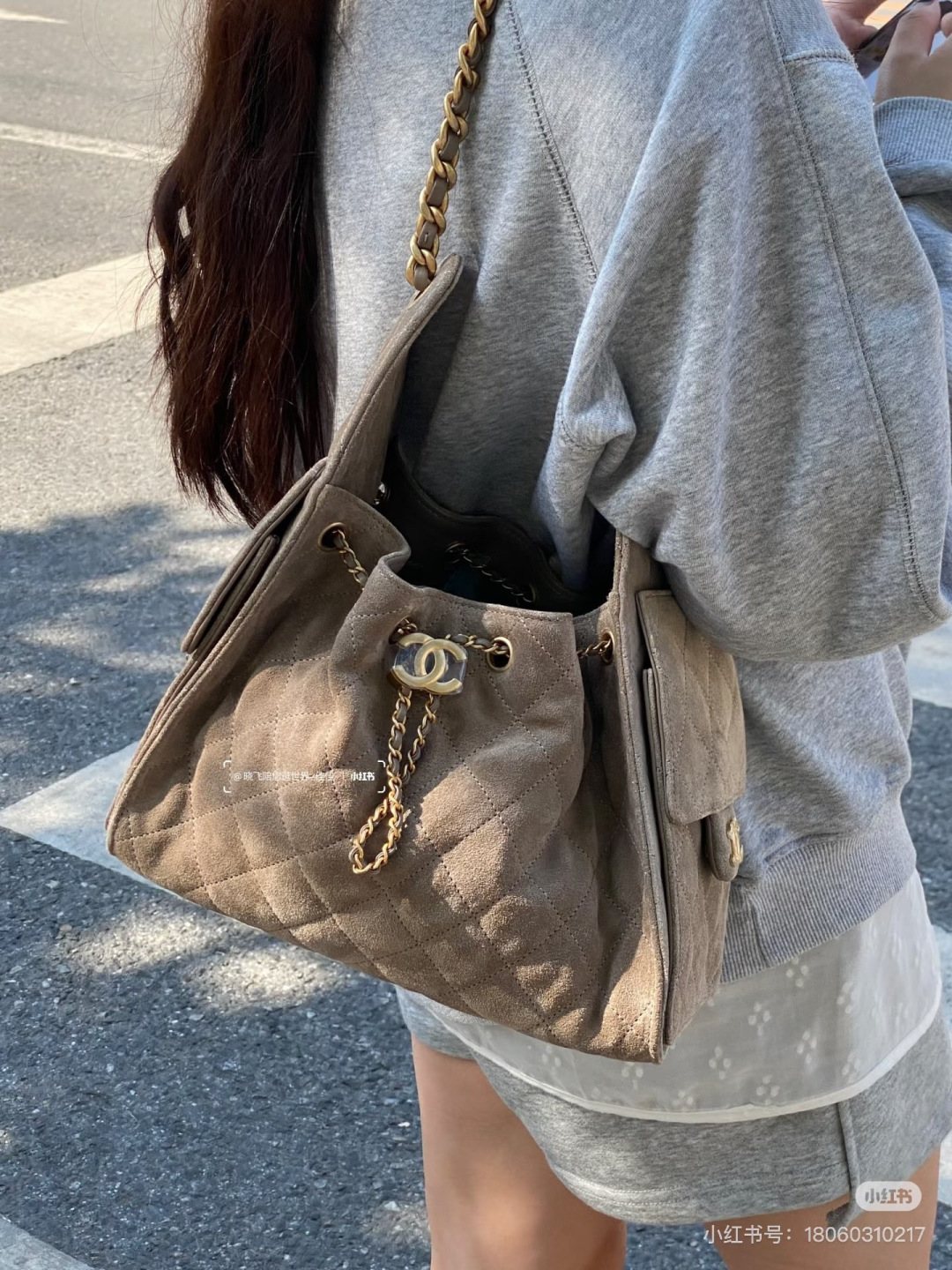 Chanel 25 Suede-Finish Quilted Hobo Bag — model