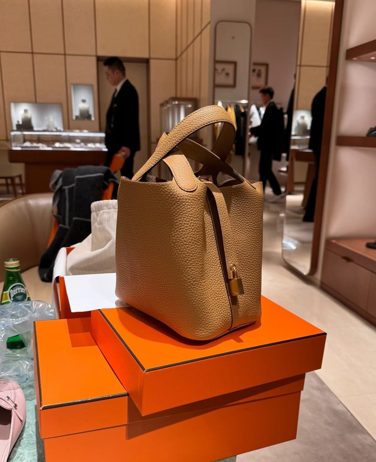 Hermès Pebbled Bucket Bag with Padlock — side