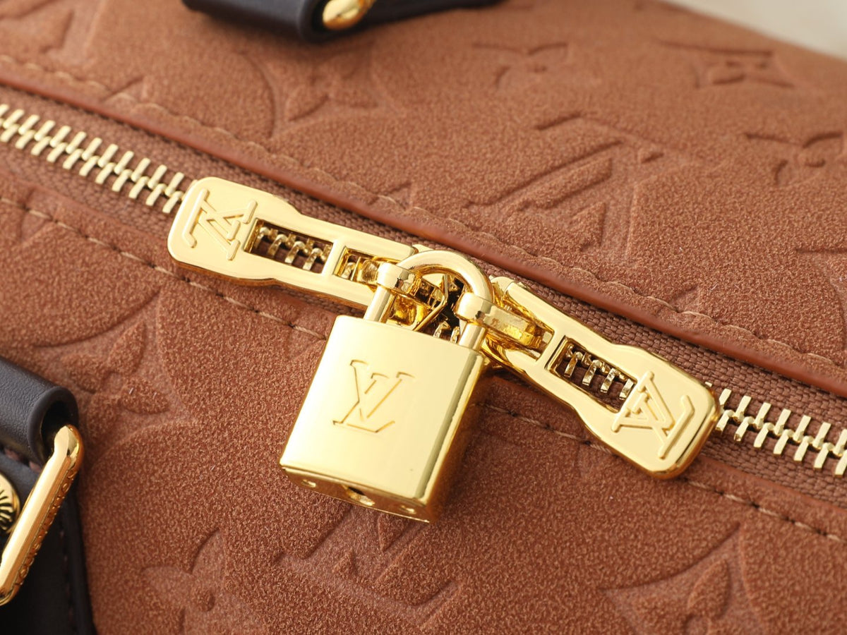 Louis Vuitton Speedy Bandoulière Embossed Suede Handbag — detail