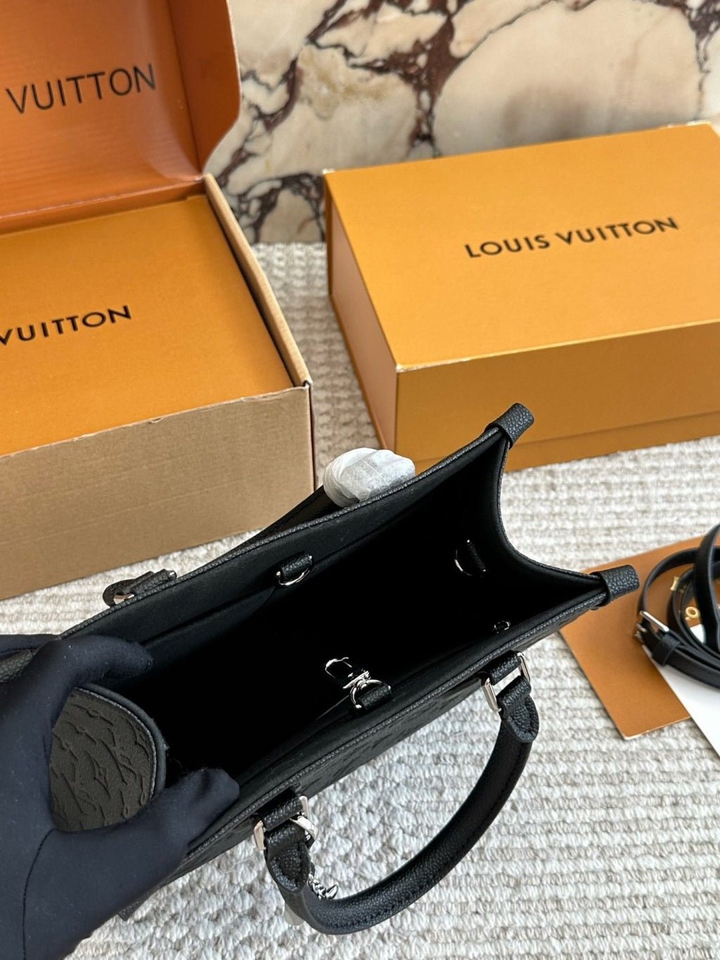 Louis Vuitton Onthego Black Embossed Tote — front
