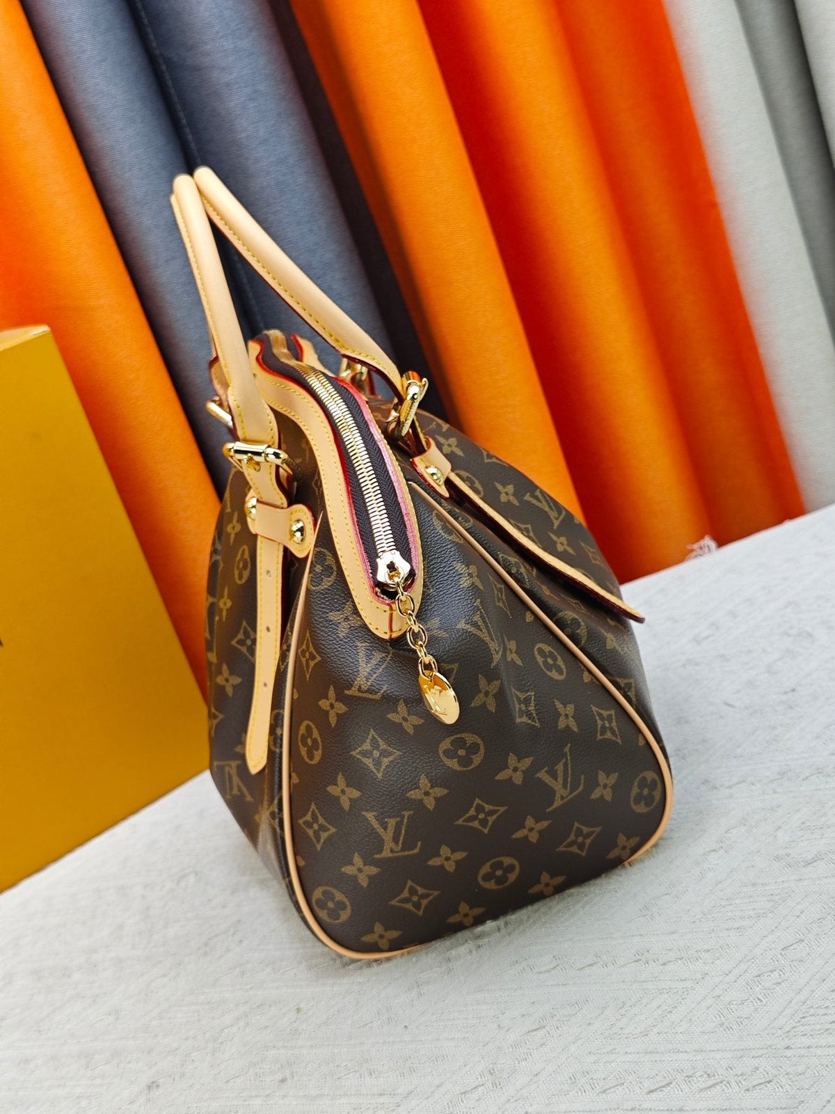 Louis Vuitton Tivoli Monogram Bowling Handbag — side