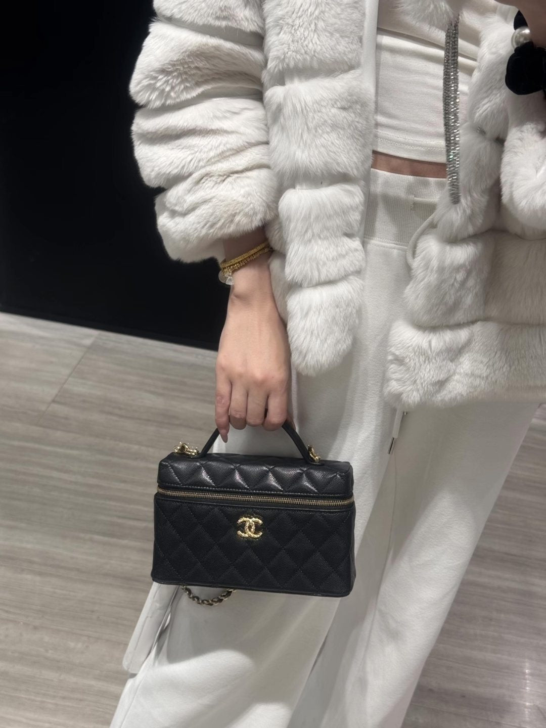 Chanel Diamond-Quilted Top-Handle Box Bag — model