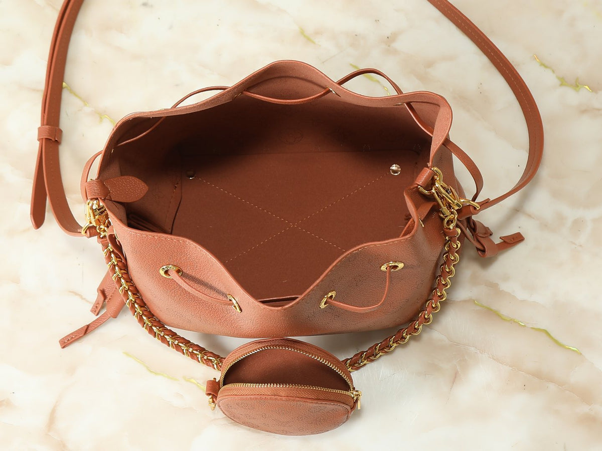 Louis Vuitton Bella Perforated Monogram Bucket Bag — detail