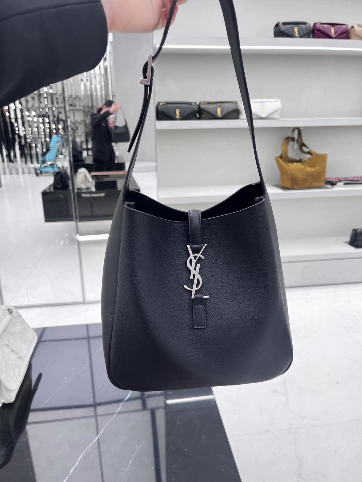 Saint Laurent Black Curved Hobo Shoulder Bag — hero