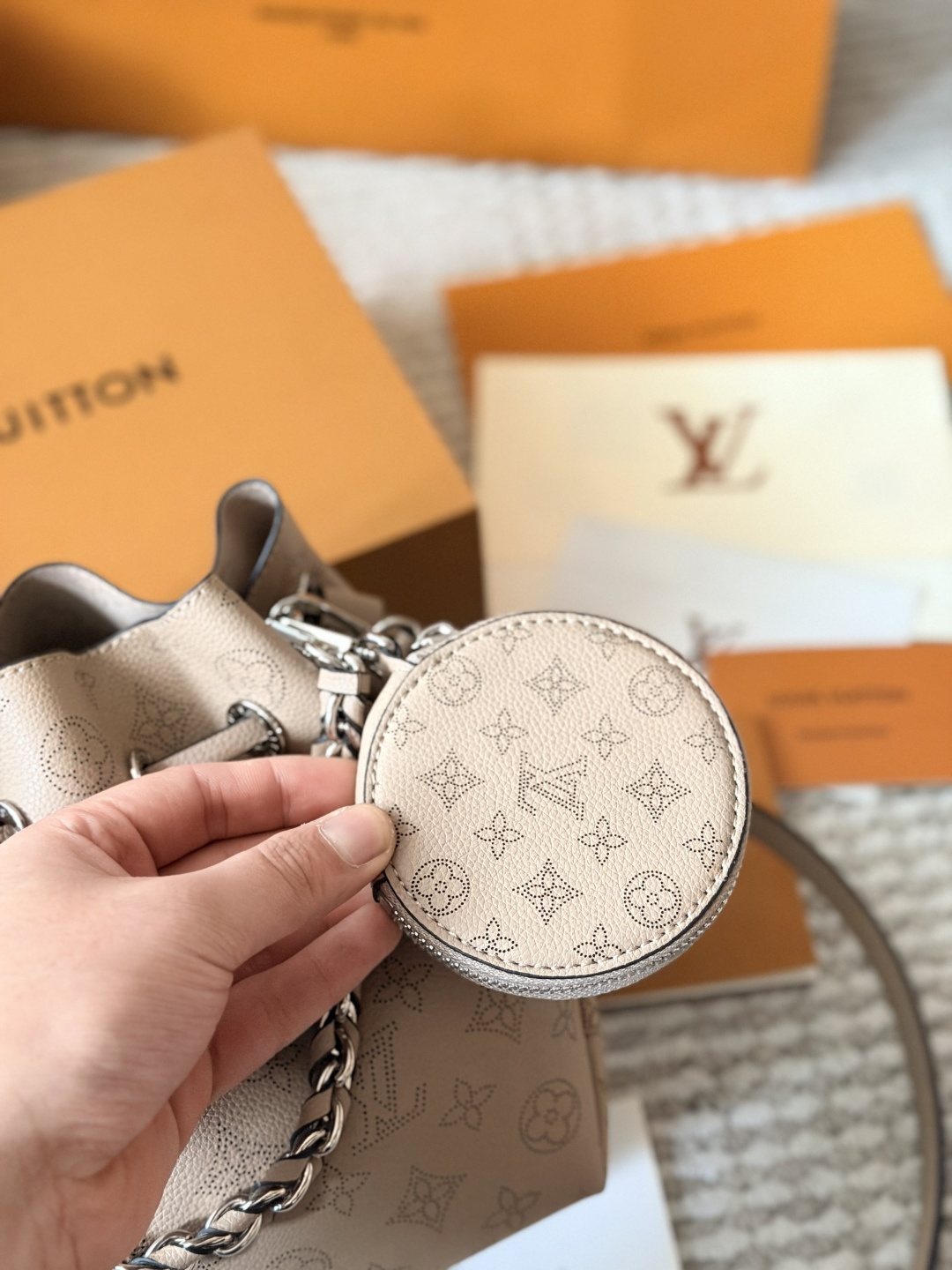 Louis Vuitton Bella Perforated Monogram Bucket Bag — detail