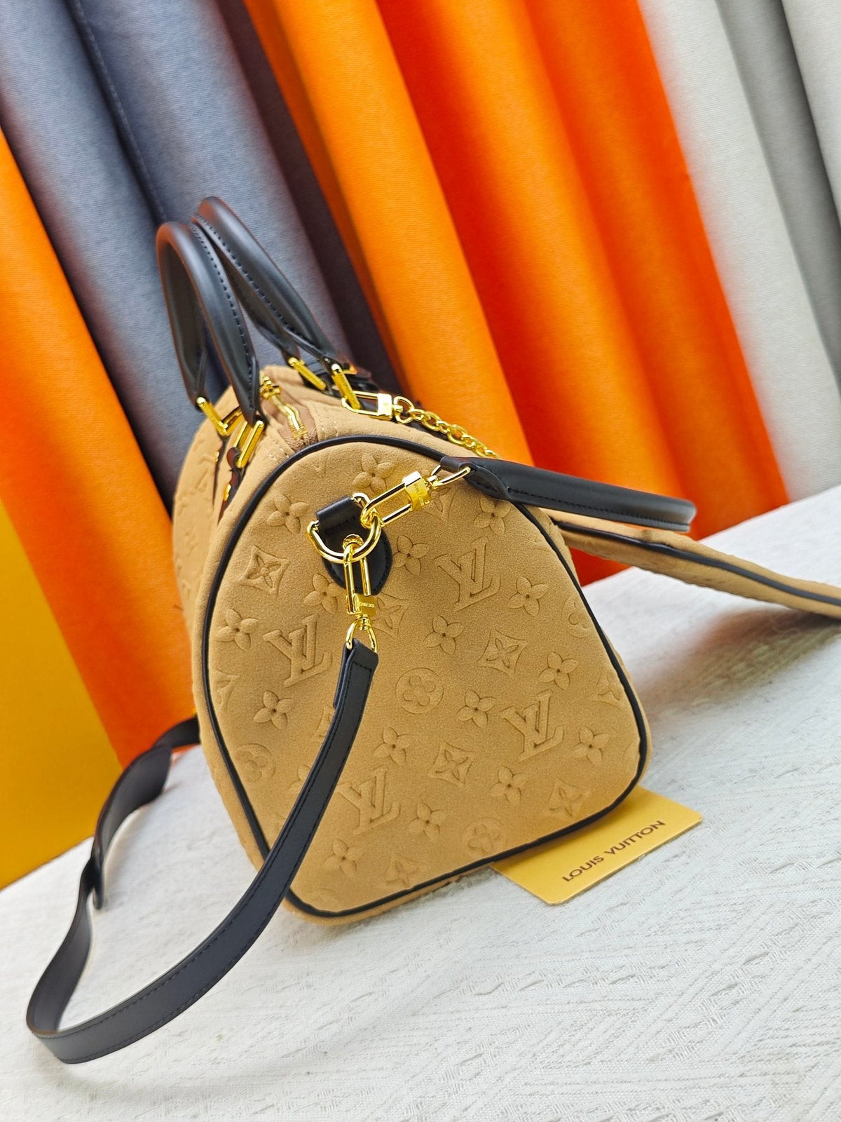 Louis Vuitton Speedy Soft Embossed Monogram Satchel — side