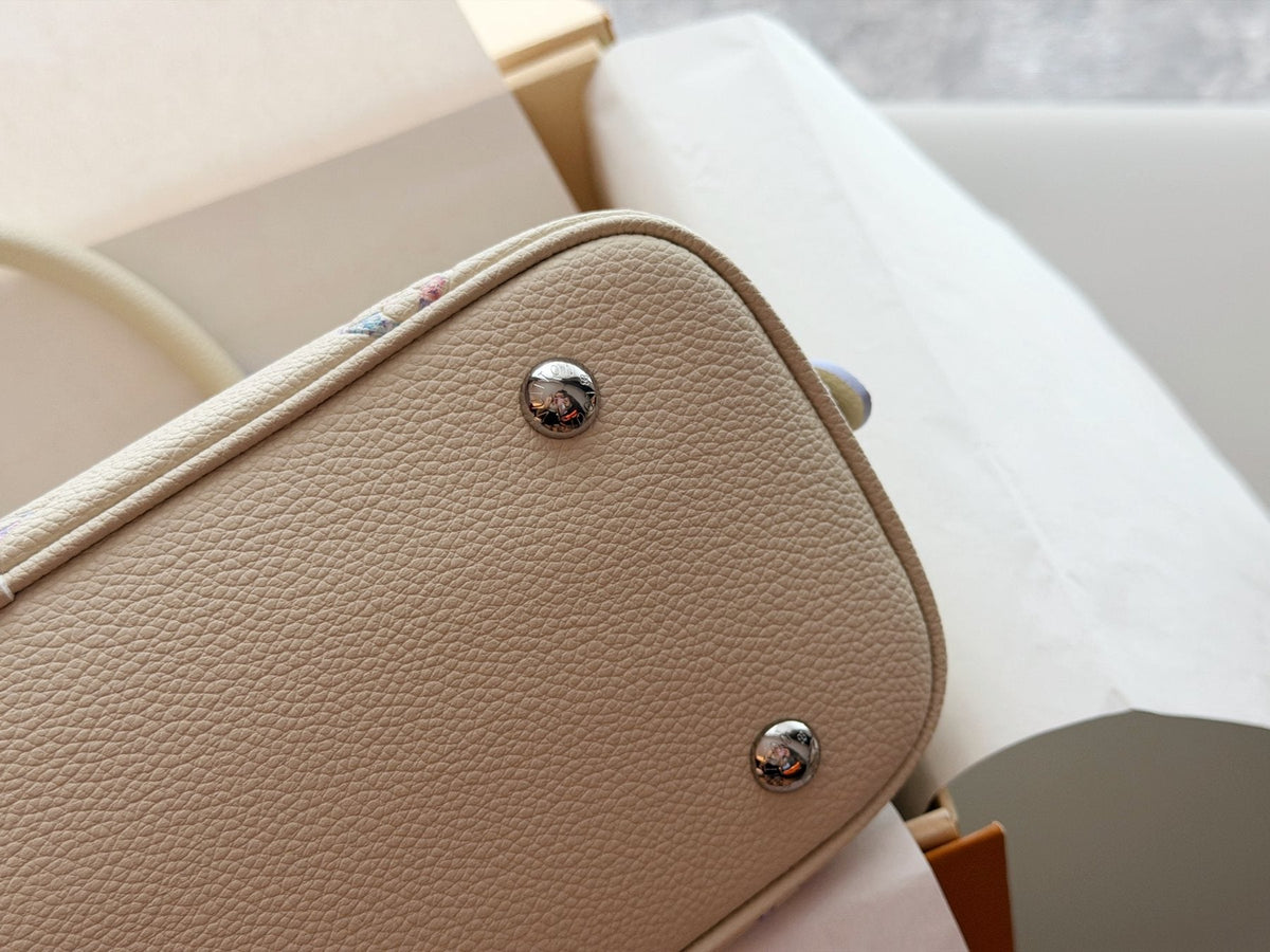 Louis Vuitton Alma Pastel Monogram Handbag — detail