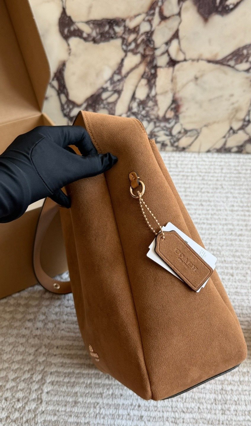 Coach Rounded-Tab Bucket Bag — side