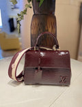 Louis Vuitton Cluny BB Glossy Textured Top-Handle Bag — hero