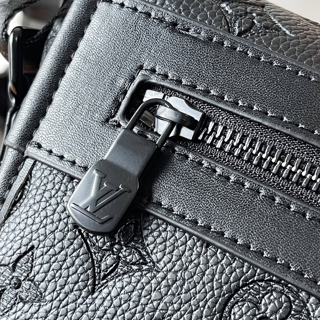Louis Vuitton Courrier Monogram Messenger Bag — detail