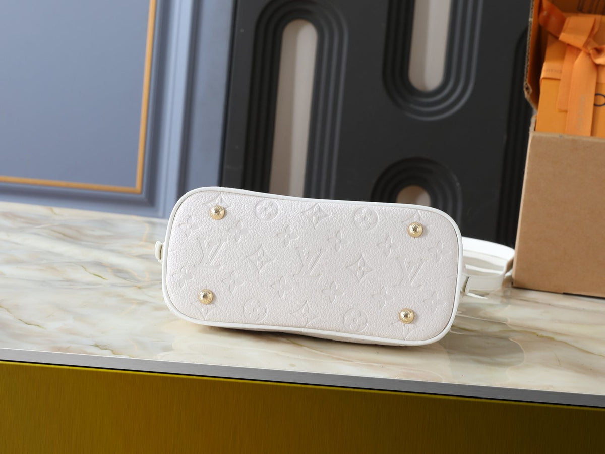 Louis Vuitton Alma BB Monogram Empreinte Bag — detail