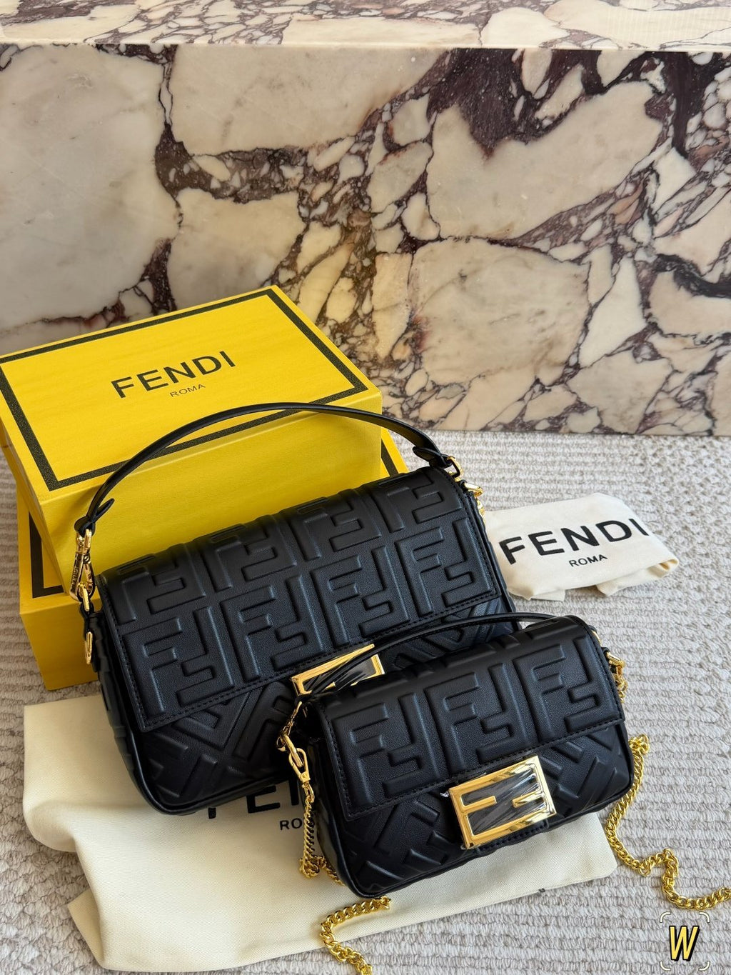 Fendi Baguette Raised FF Motif Bag — comparison