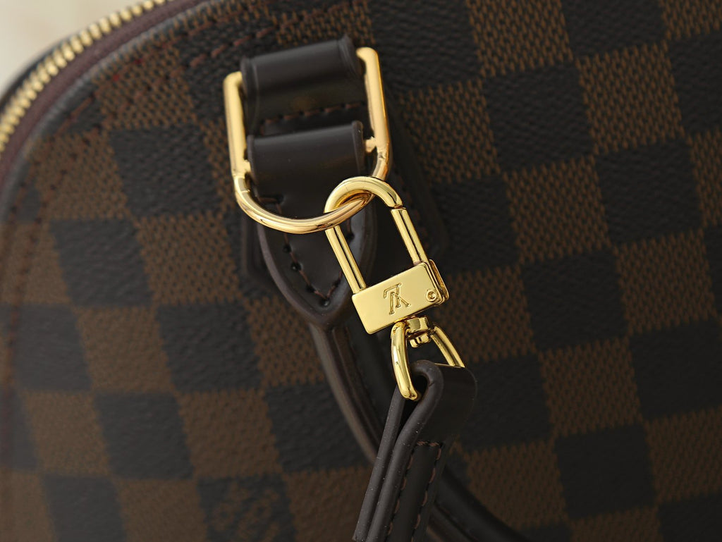 Louis Vuitton Alma Structured Top-Handle Bag — detail