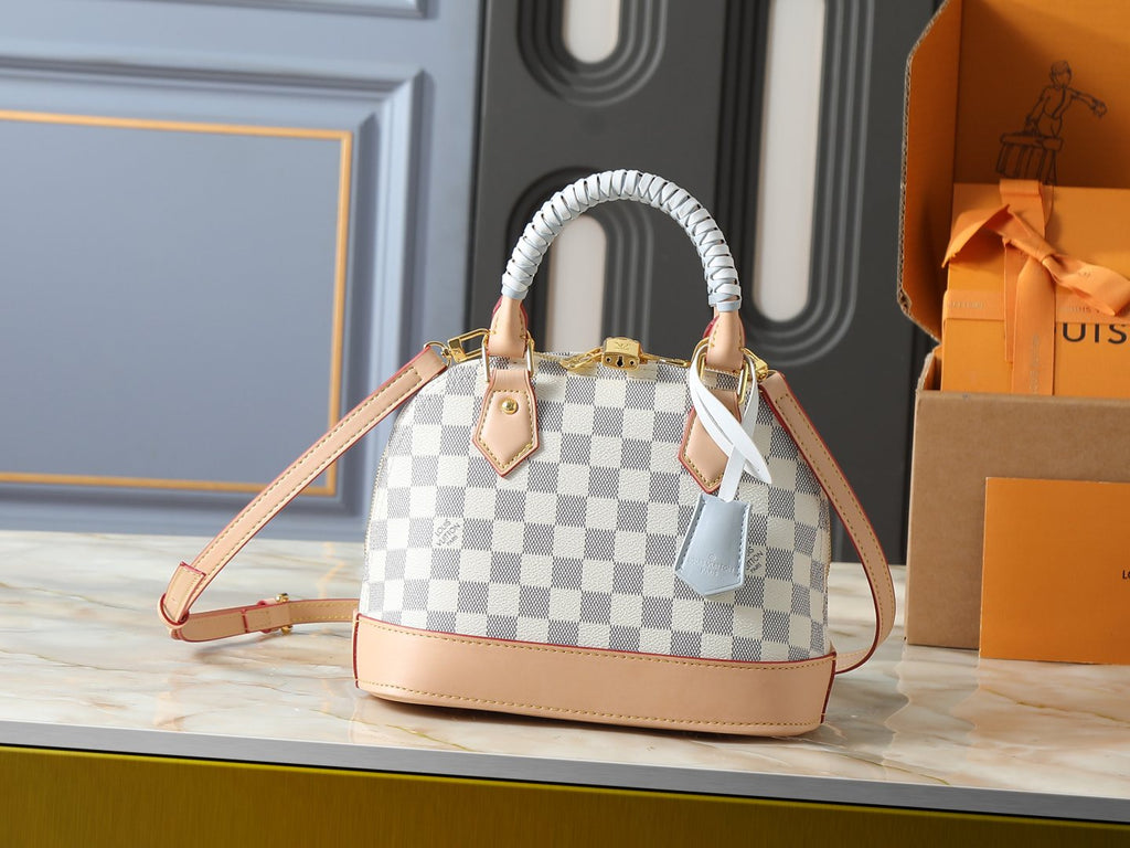Louis Vuitton Alma Structured Top-Handle Bag — hero