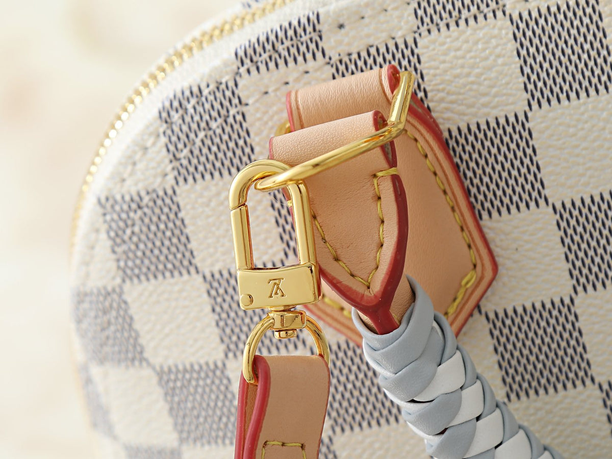 Louis Vuitton Alma Structured Top-Handle Bag — detail