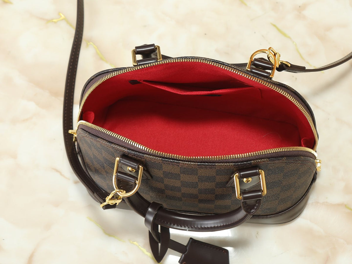 Louis Vuitton Alma Structured Top-Handle Bag — detail