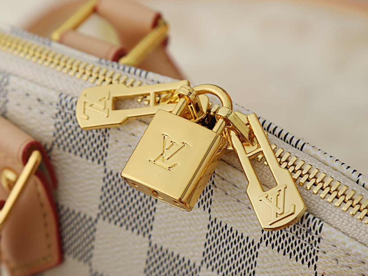 Louis Vuitton Alma Structured Top-Handle Bag — detail