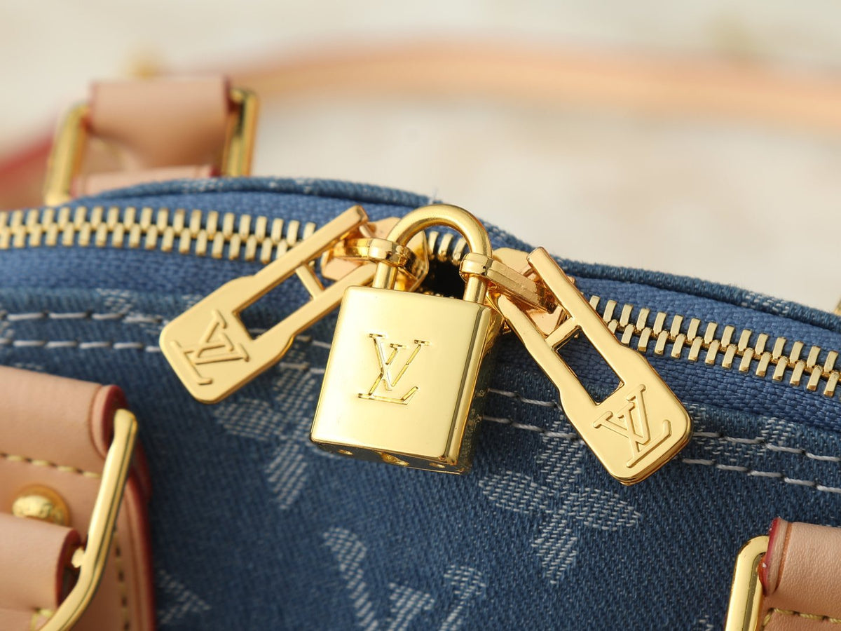 Louis Vuitton Alma Structured Top-Handle Bag — detail
