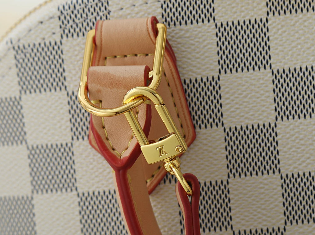 Louis Vuitton Alma Structured Top-Handle Bag — detail