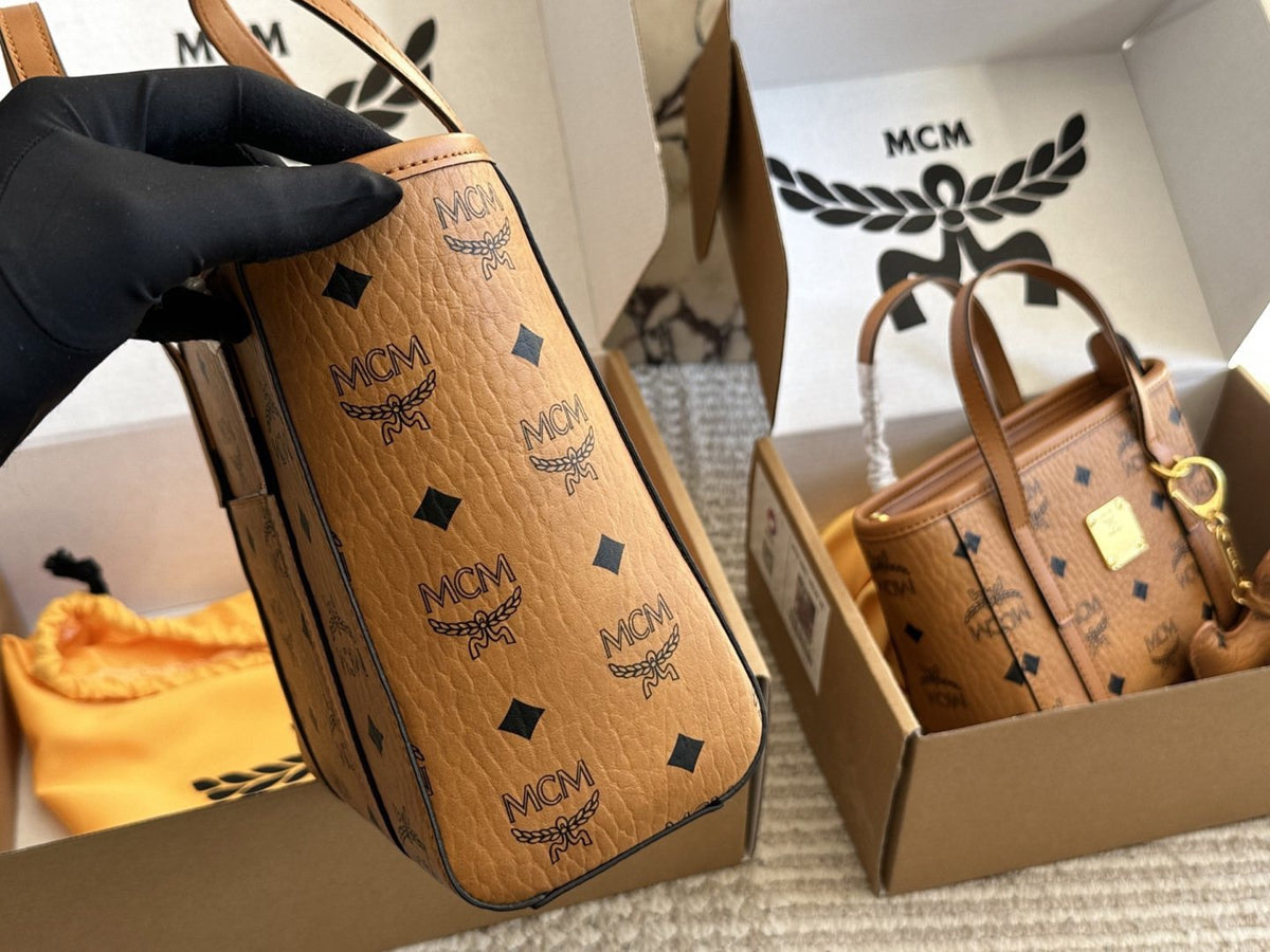 MCM Anya Monogram Tote — side