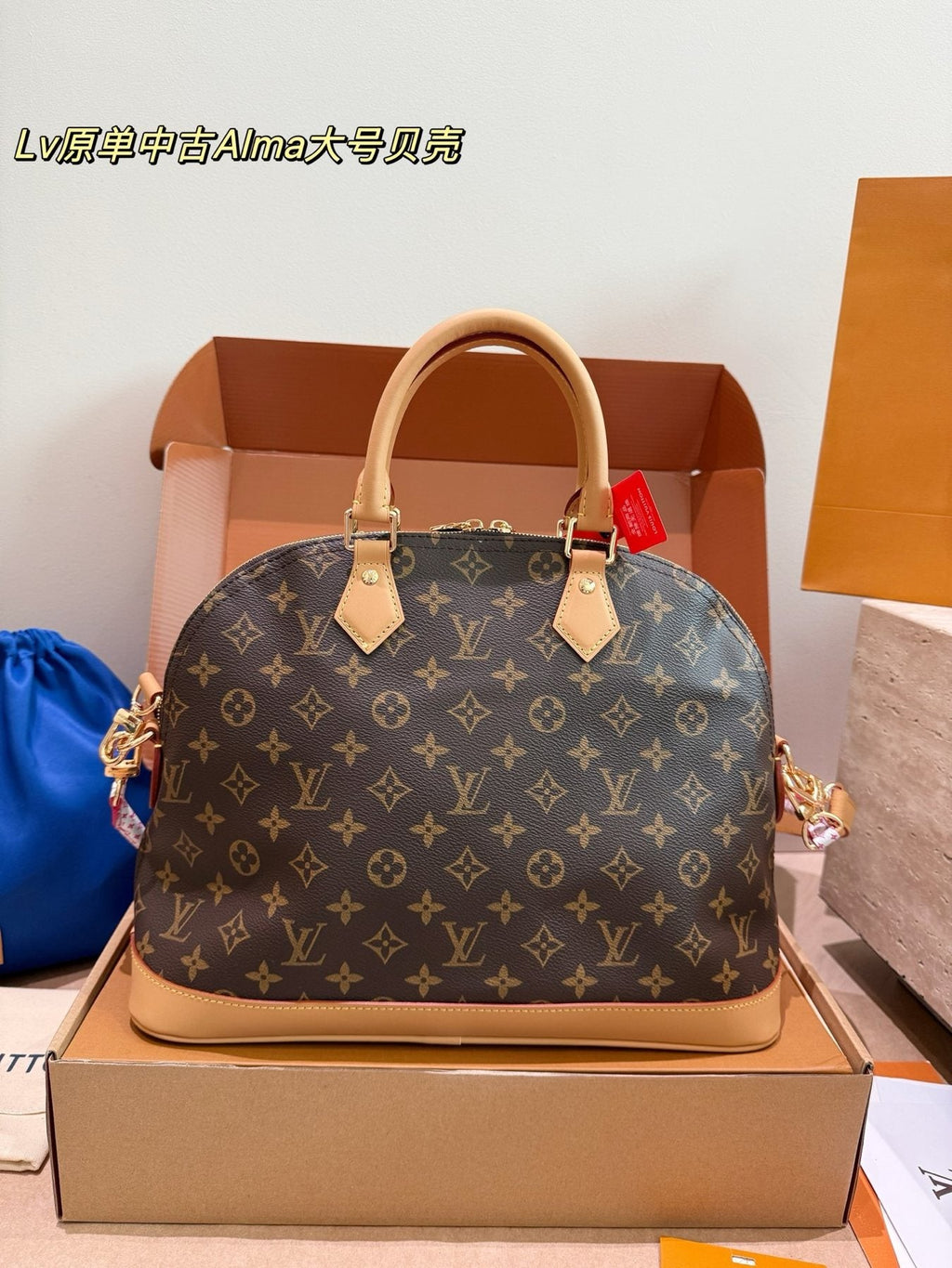 Louis Vuitton Alma Monogram Handbag with Pink Strap — front