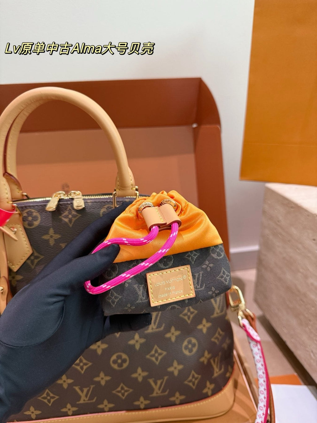 Louis Vuitton Alma Monogram Handbag with Pink Strap — detail
