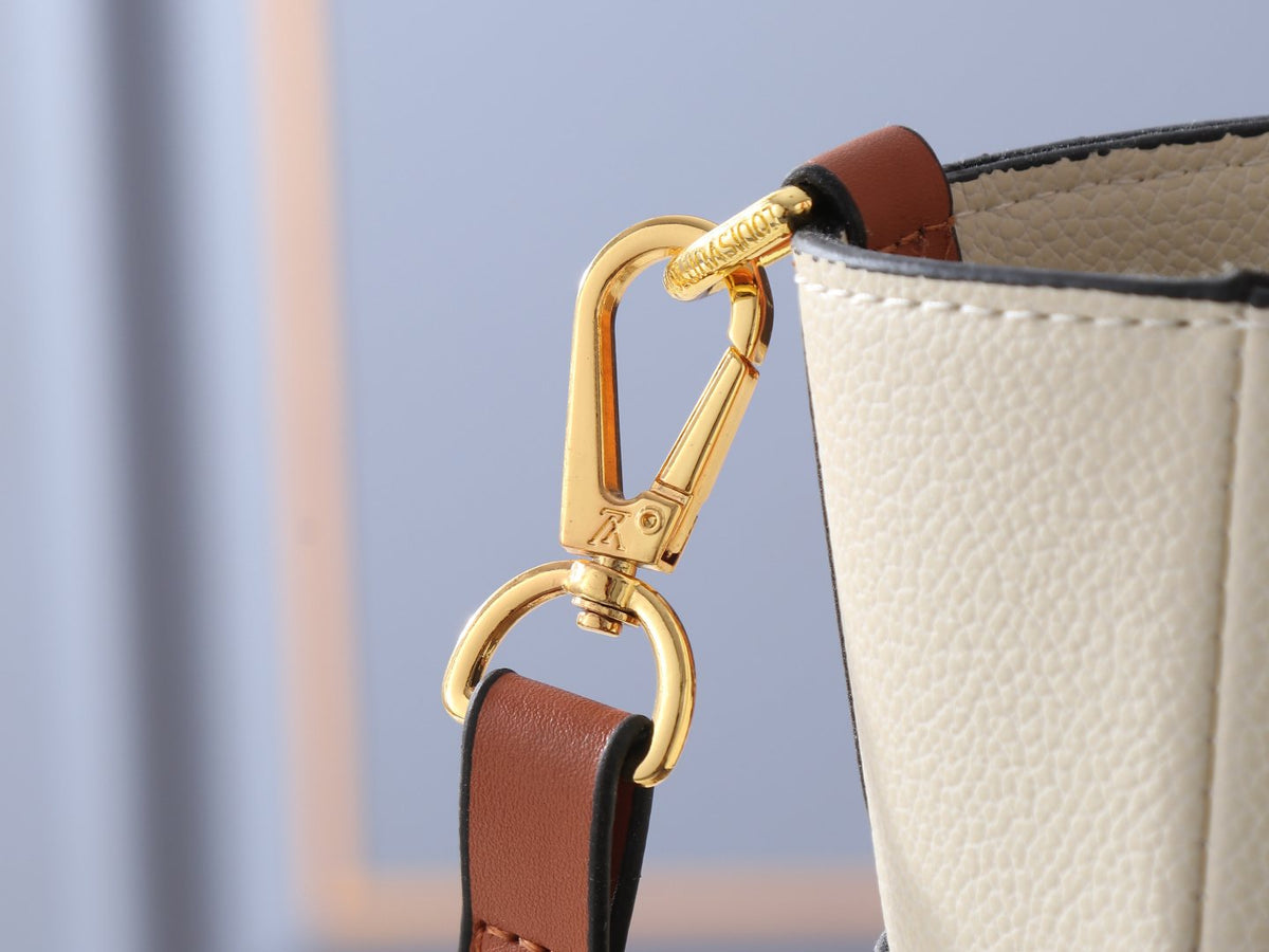 Louis Vuitton On My Side Turnlock Tote — detail
