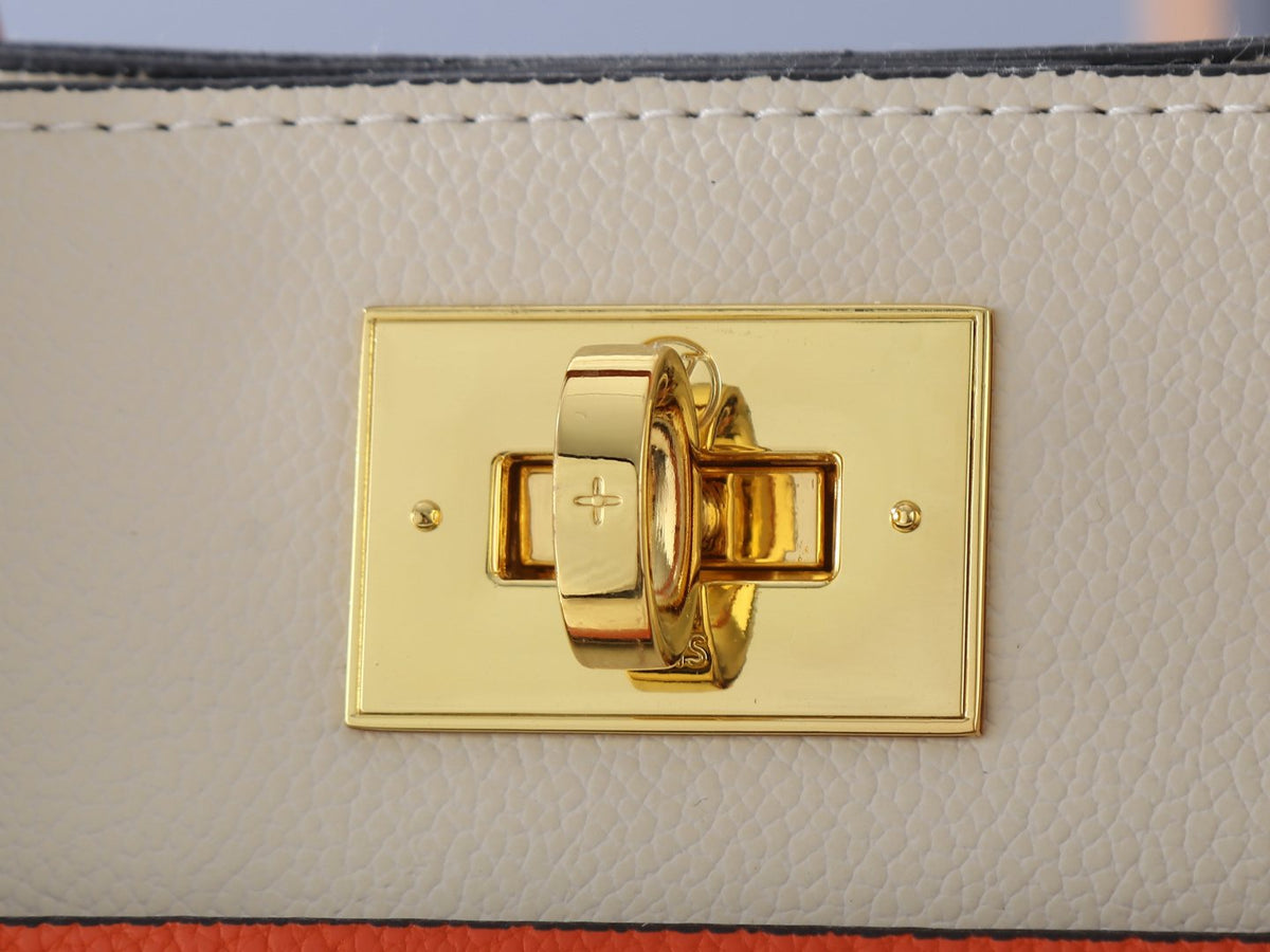 Louis Vuitton On My Side Turnlock Tote — detail