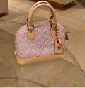 Louis Vuitton Alma BB Monogram Top-Handle Bag — front