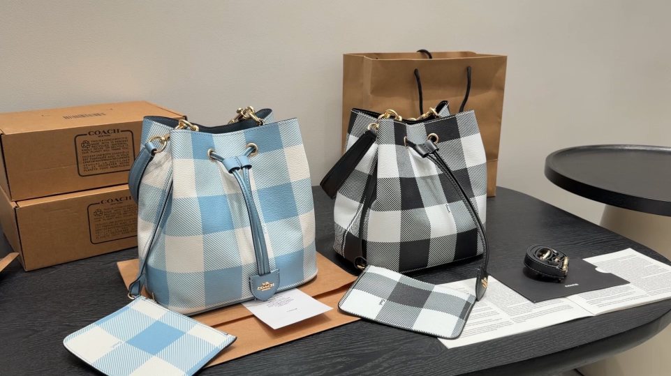 Coach Rowan Check Drawstring Bucket Bag — hero