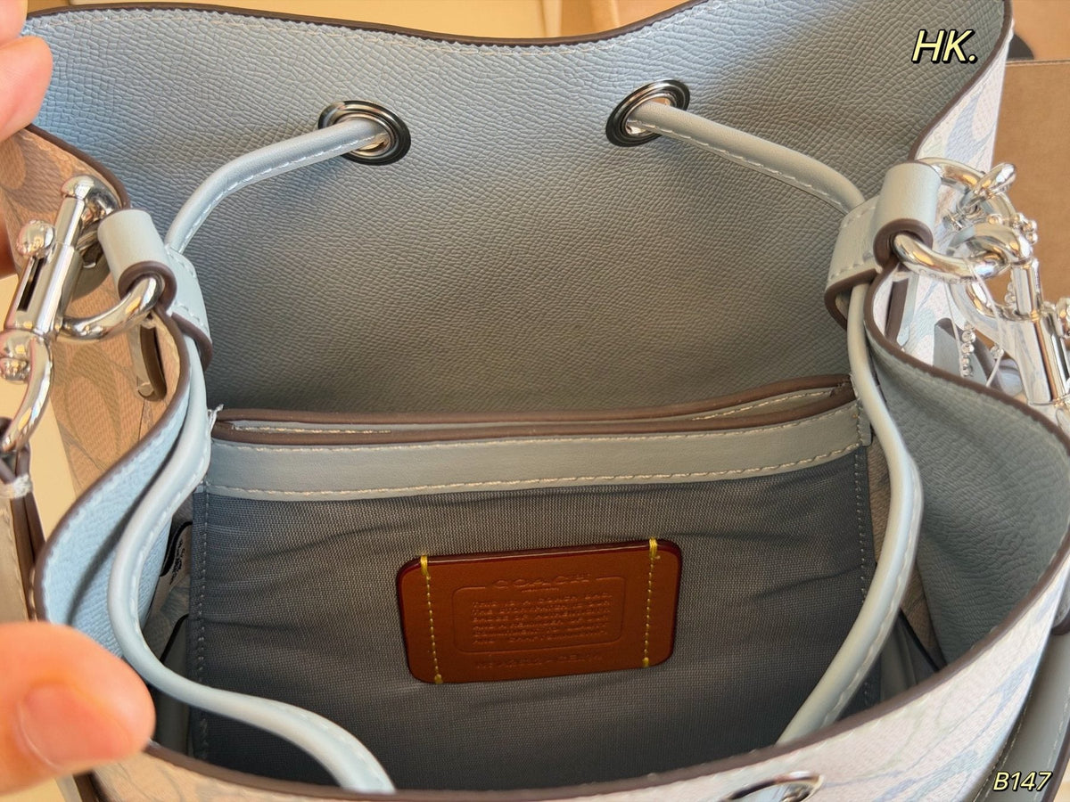 Coach Rowan Pastel Signature Drawstring Bucket Bag — detail