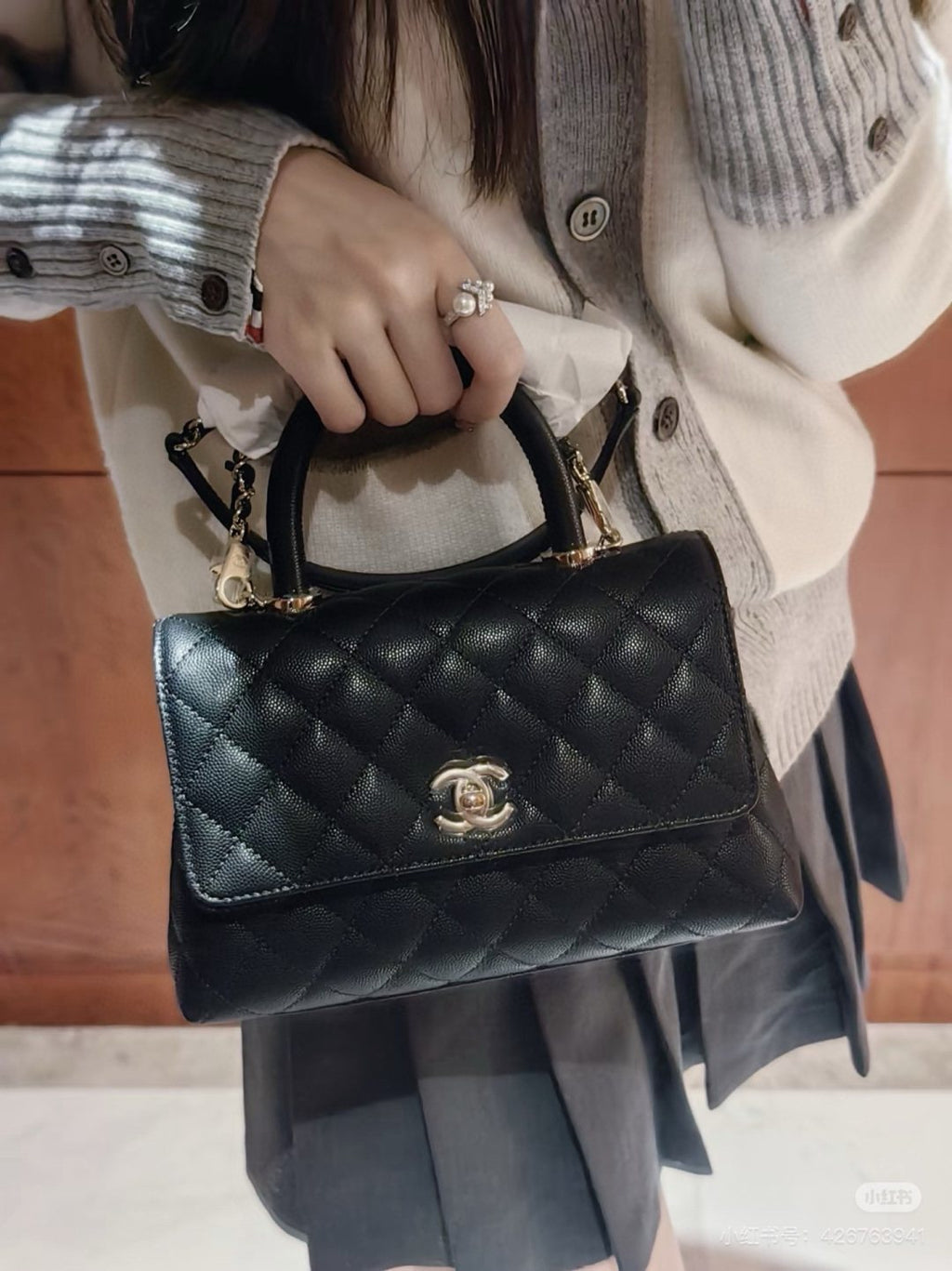 Chanel Coco Handle Quilted Top-Handle Bag — model