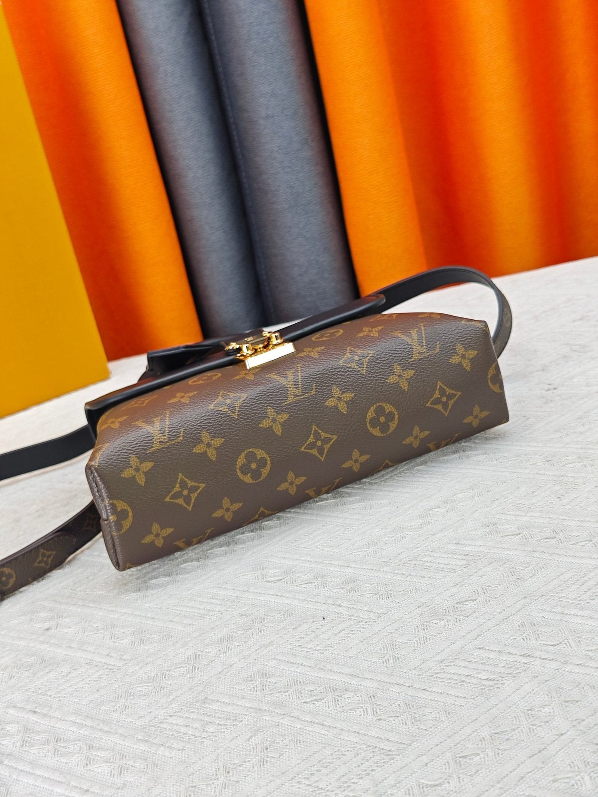 Louis Vuitton Madeleine BB Monogram Top-Handle Bag — detail