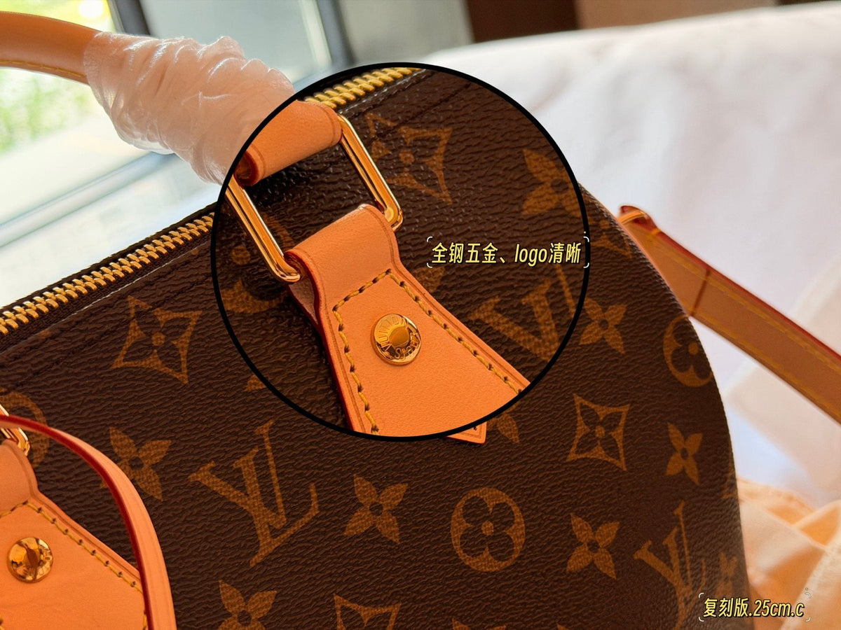 Louis Vuitton Speedy Monogram Satchel with Tan Trim — detail
