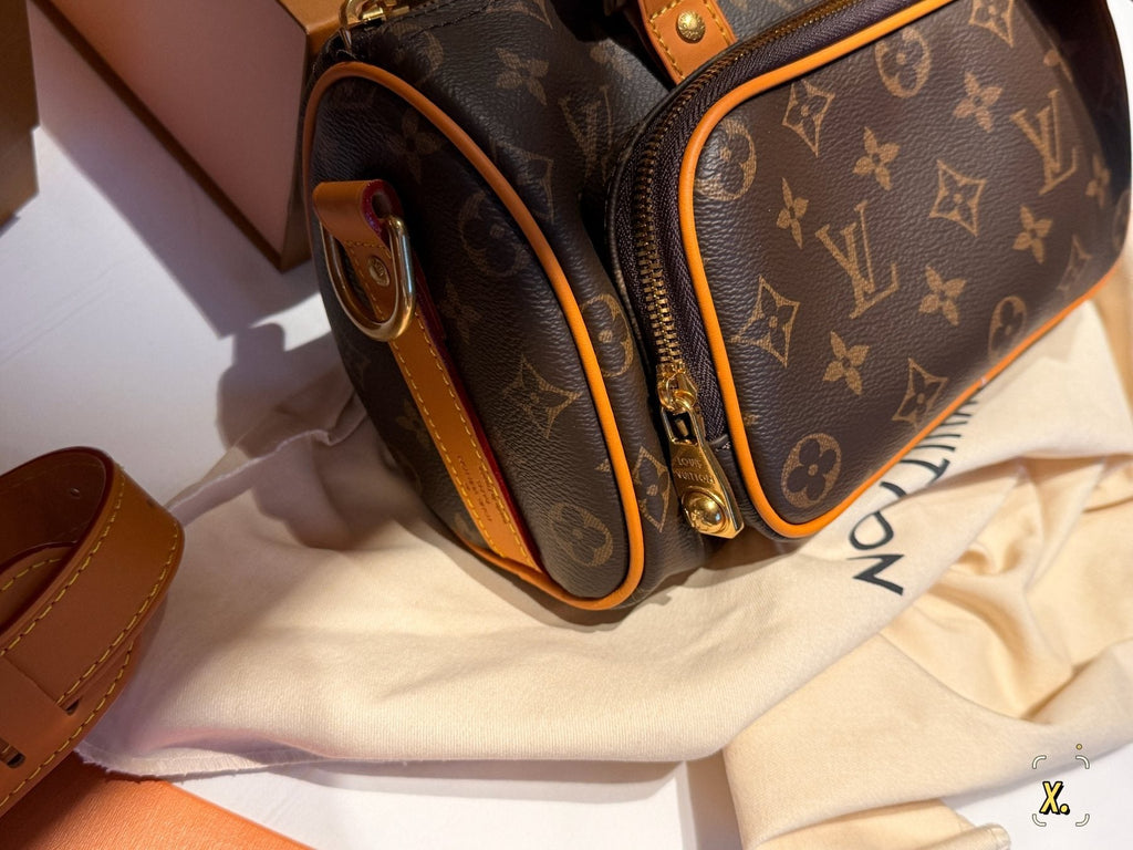 Louis Vuitton Keepall Front Pocket Barrel Bag — detail
